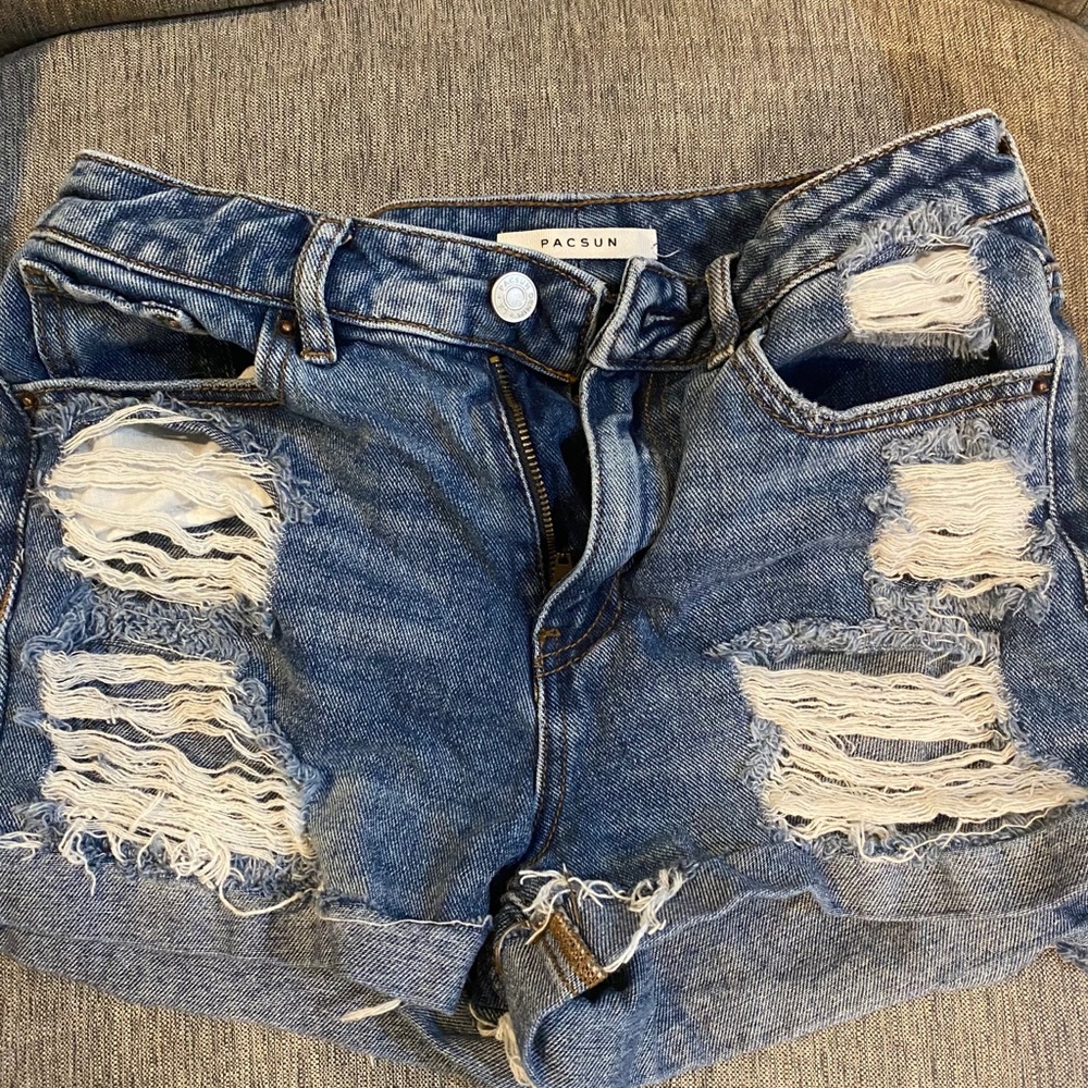 Destroyed denim shorts